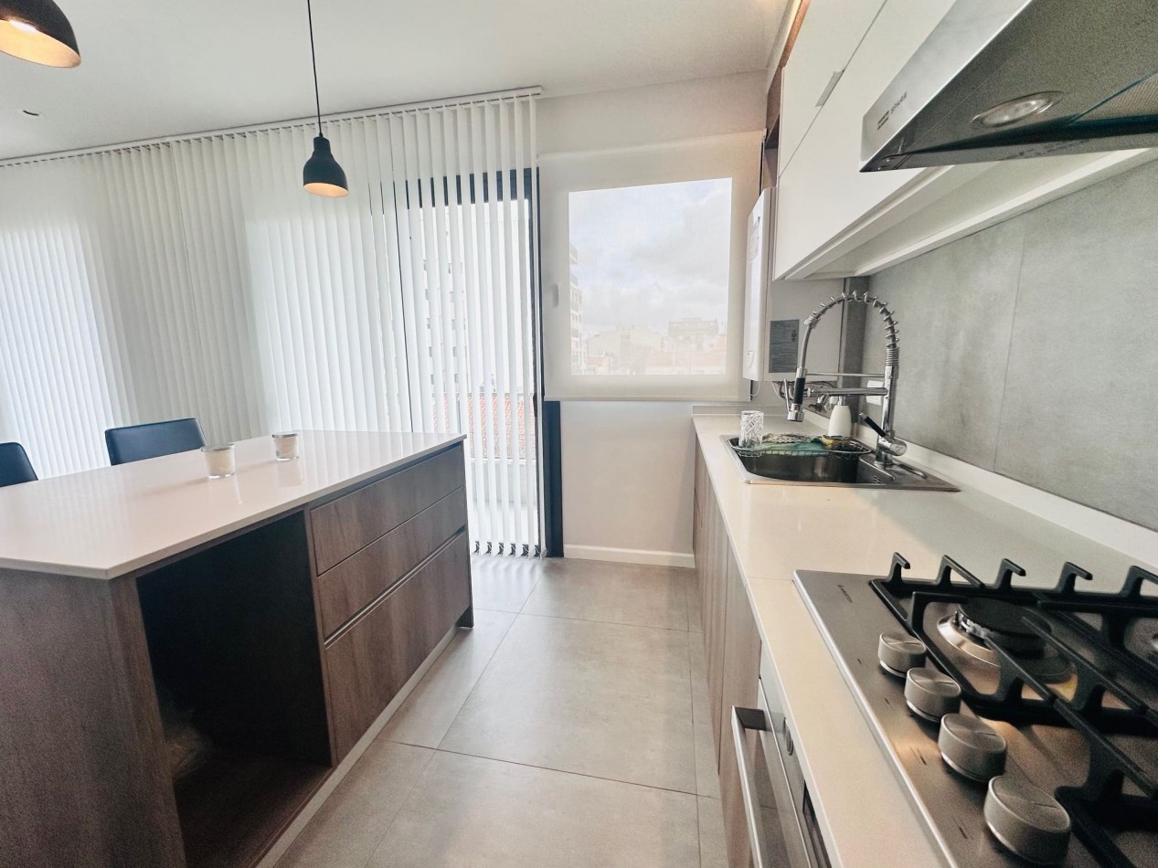 Piso moderno 4 ambientes, cochera y terraza privada Guemes